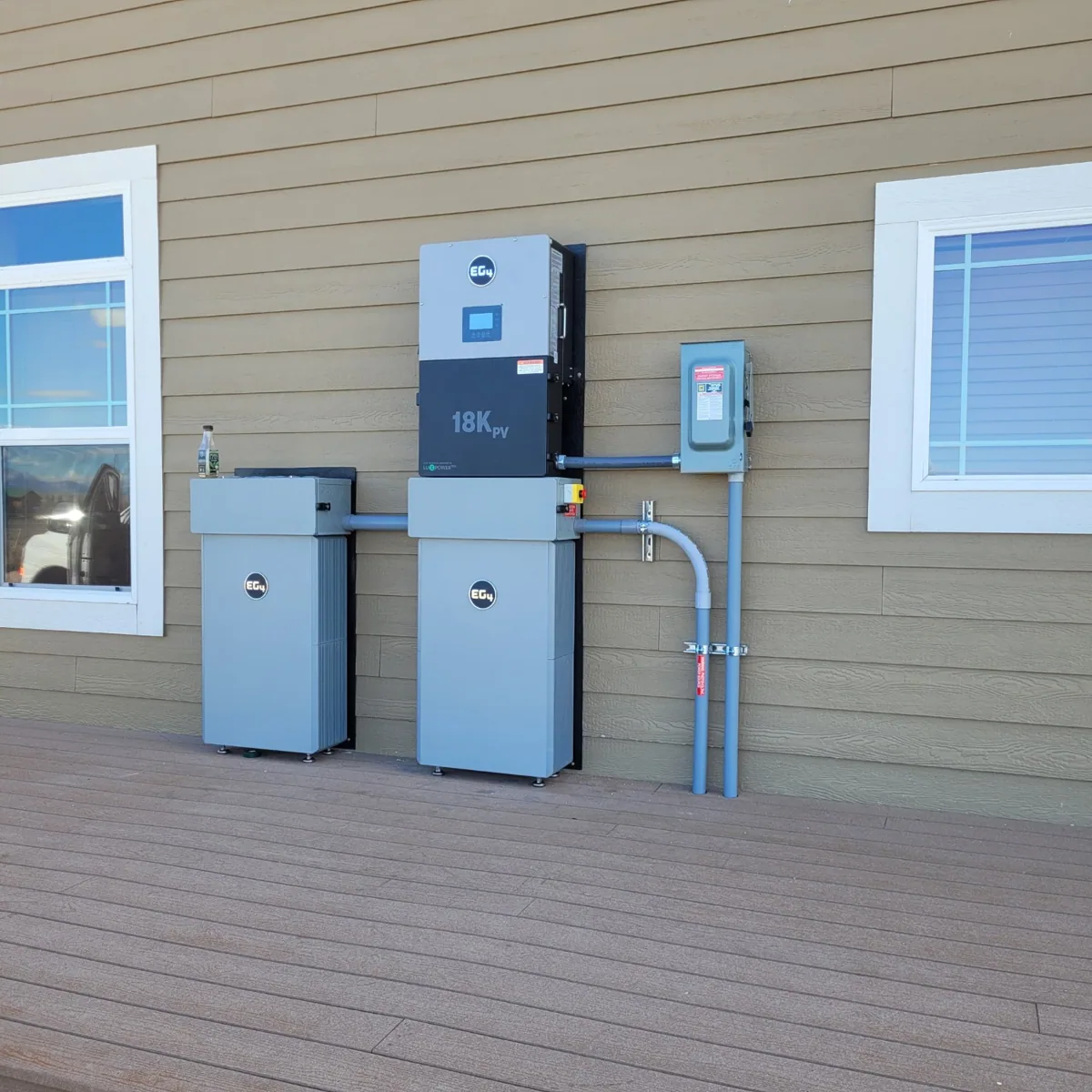 Outdoor EG4 battery storage and inverter installation by The Solar Guys - Northeastern Wyoming